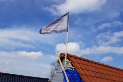 vlag in top wolvega dakopbouw